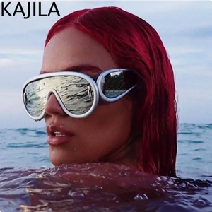Sexy girl with red hair in the ocean with her head out of the water wearing a pair of Silver Oversized Punk UV400 Sunglasses Color 7