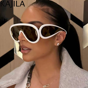 Headshot of a sexy girl wearing a pair of White & Brown Oversized Punk UV400 Sunglasses Color 2 